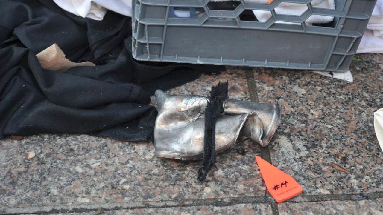 A federal law enforcement source with firsthand knowledge of the investigation told CNN that a lid to a pressure cooker -- thought to have been used in the bombings -- had been found on a roof of a building near the scene.