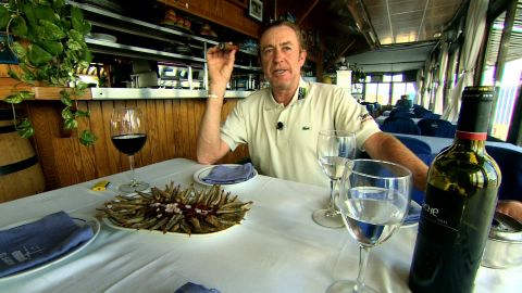 Food and drink are just two of Jimenez's passions in life -- along with his trusty cigar.