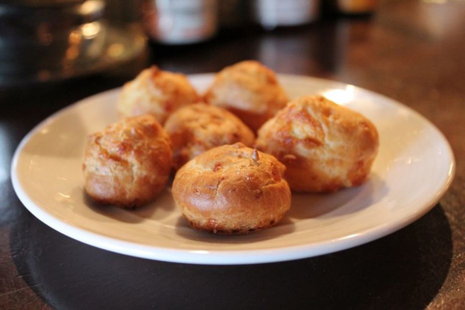 If you haven't tried gougères, yet -- baked savory choux pastries of dough andcheese -- it's time you started. At No. 9 Park, they're so good you'd gladly pay for them -- except you don't have to.
