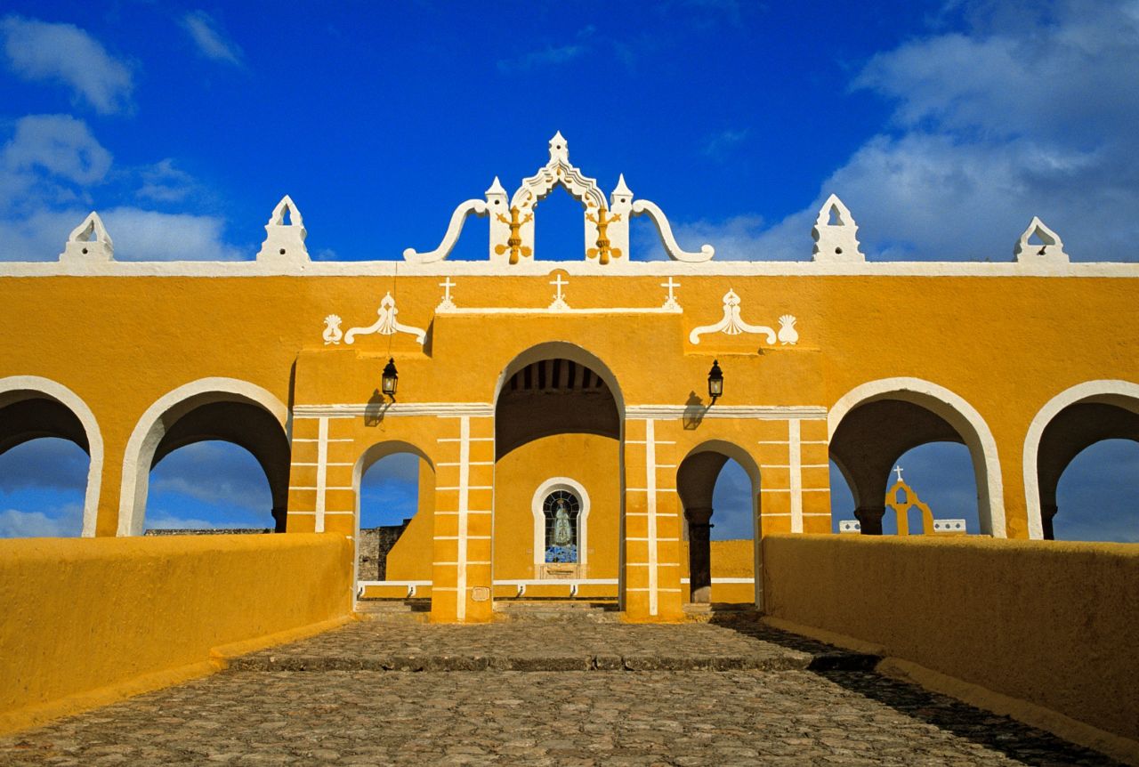The colonial buildings of Izamal, Mexico, are awash in a vivid yellow that gives the town a sunny look no matter what the weather. 
