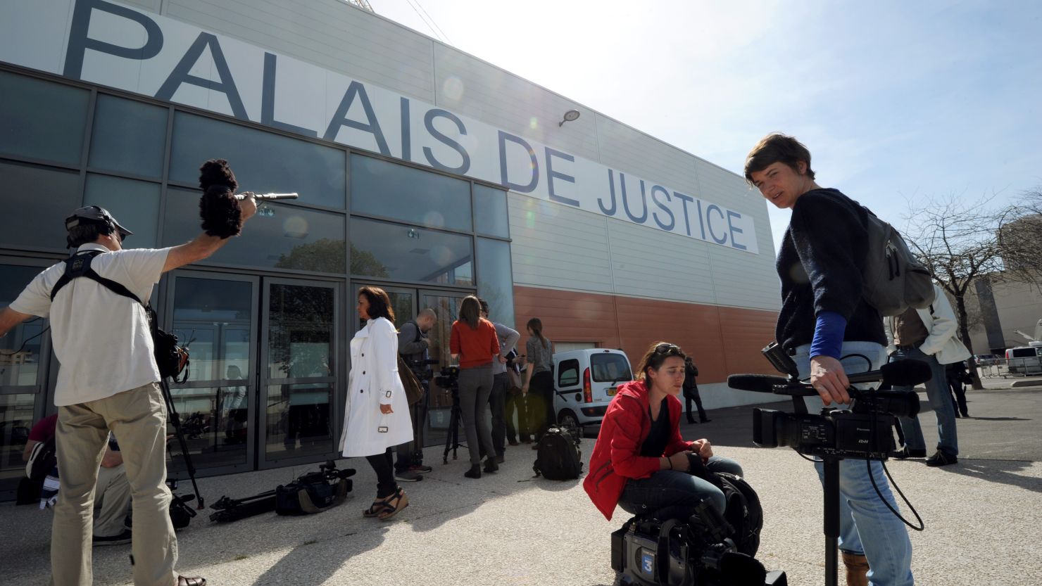 Reporters wait outside the courthouse on April 16, 2013 at the Parc Chanot in Marseille, southern France.