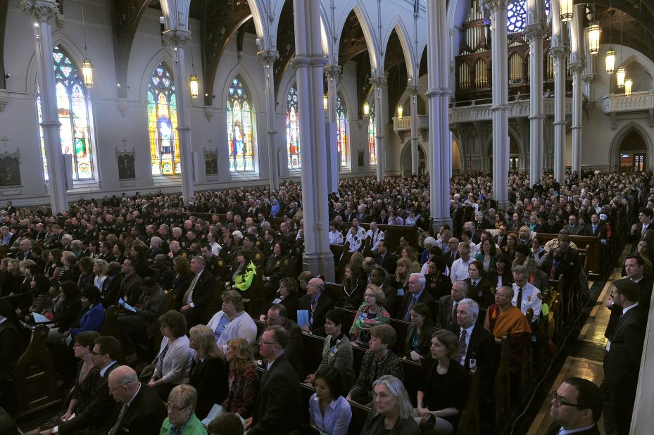 Mourners fill a Boston cathedral for an interfaith service on April 18, 2013.