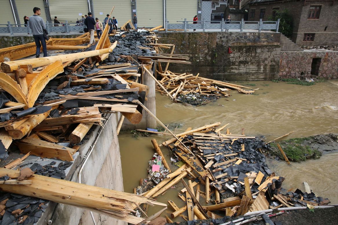 Debris litters a river after a tornado and hailstorm hit Zhenyuan County in China's southwest Guizhou Province on April 18.
