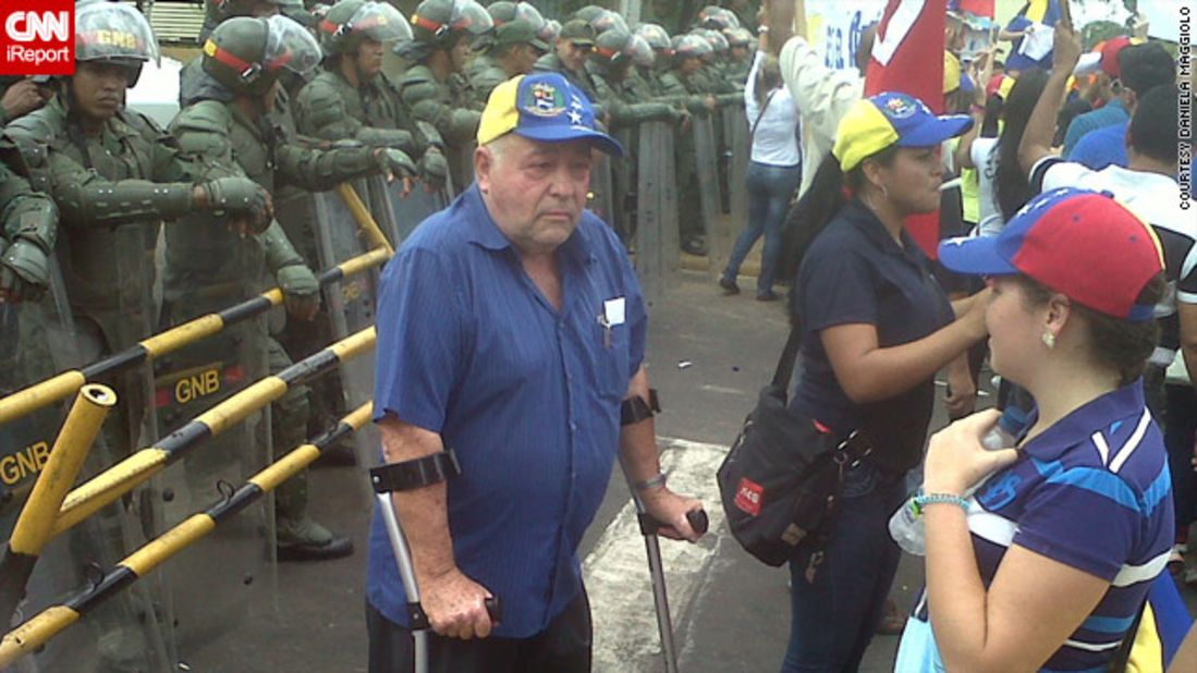 <a href="http://ireport.cnn.com/docs/DOC-957915">Daniela Maggiolo</a> from Puerto Ordaz, eastern Venezuela, was moved by this image of an elderly protester outside the city's local office for the National Electoral Council office.