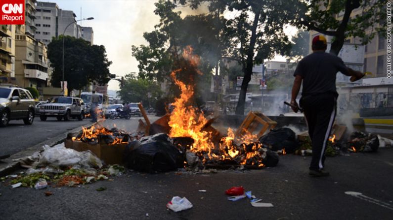 Protests have rocked Venezuela following Sunday's election, apparently won by the late president Hugo Chavez's designated successor, Nicolas Maduro. This image from <a href="index.php?page=&url=http%3A%2F%2Fireport.cnn.com%2Fdocs%2FDOC-957922">Luis Miguel Bastardo</a> shows burning trash and tires on a Caracas Street.
