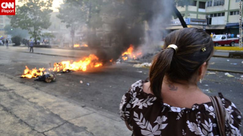 Supporters of opposition candidate Henrique Capriles Radonski have held demonstrations, blocked roads and banged pots and pans in the street, demanding a vote recount. Bastardo, who shot this photograph, says he and others are banging pots as a pacifist way of protesting.