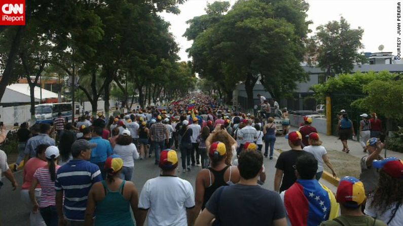 Protests have not been confined to Caracas. In Barquisimeto, northwest Venezuela, iReporter Juan Pereira here joins an <a href="index.php?page=&url=http%3A%2F%2Fireport.cnn.com%2Fdocs%2FDOC-957665">opposition march</a> to the National Electoral Council office to call for a recount. But offices were closed, he said.  