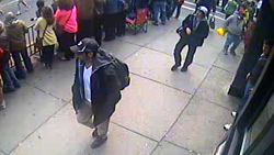 The FBI on Thursday, April 18, released photos and video of two men it called suspects in the deadly bombings at the Boston Marathon and pleaded for public help in identifying them. The two men were photographed walking together near the finish line of the marathon before the explosions that killed three people and wounded about 180.