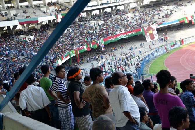 Kolkata's Saltlake football stadium is one of the largest in Asia, with a capacity of 120,000. Pictured here, supporters of the oldest team in the country -- Mohun Bagan A.C. -- watch their team play an I-League match against Pune F.C in May 2012. Kolkata is the birthplace of Indian football, with British soldiers introducing the sport in the 19th century.