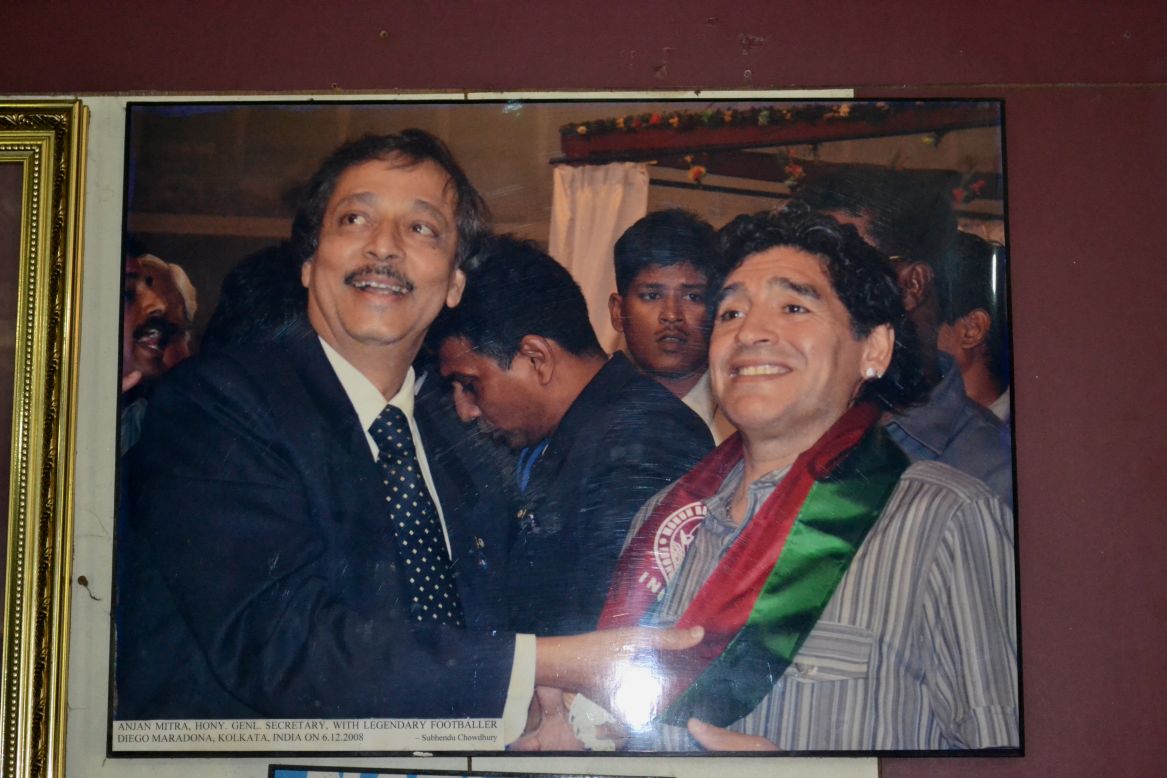 A photograph on the wall of the Mohun Bagan headquarters shows club secretary Anjan Mitra greeting legendary Argentine footballer Diego Maradona on December 6, 2008.