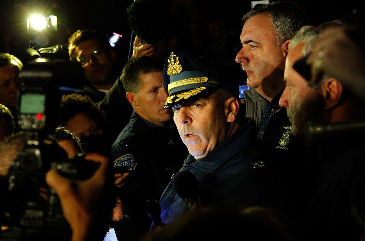 Boston Police Commissioner Edward Davis speaks to the media on April 19, 2013, and explains that the city is on lockdown until the surviving suspect is found.