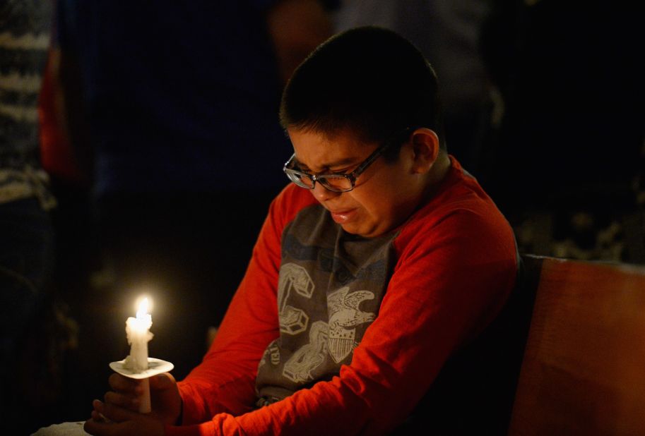 Eric Garcia, 12, cries during a candlelight vigil in West, Texas, honoring the victims of the explosion on April 18. More than 200 people were injured and 50 homes destroyed in the small town.