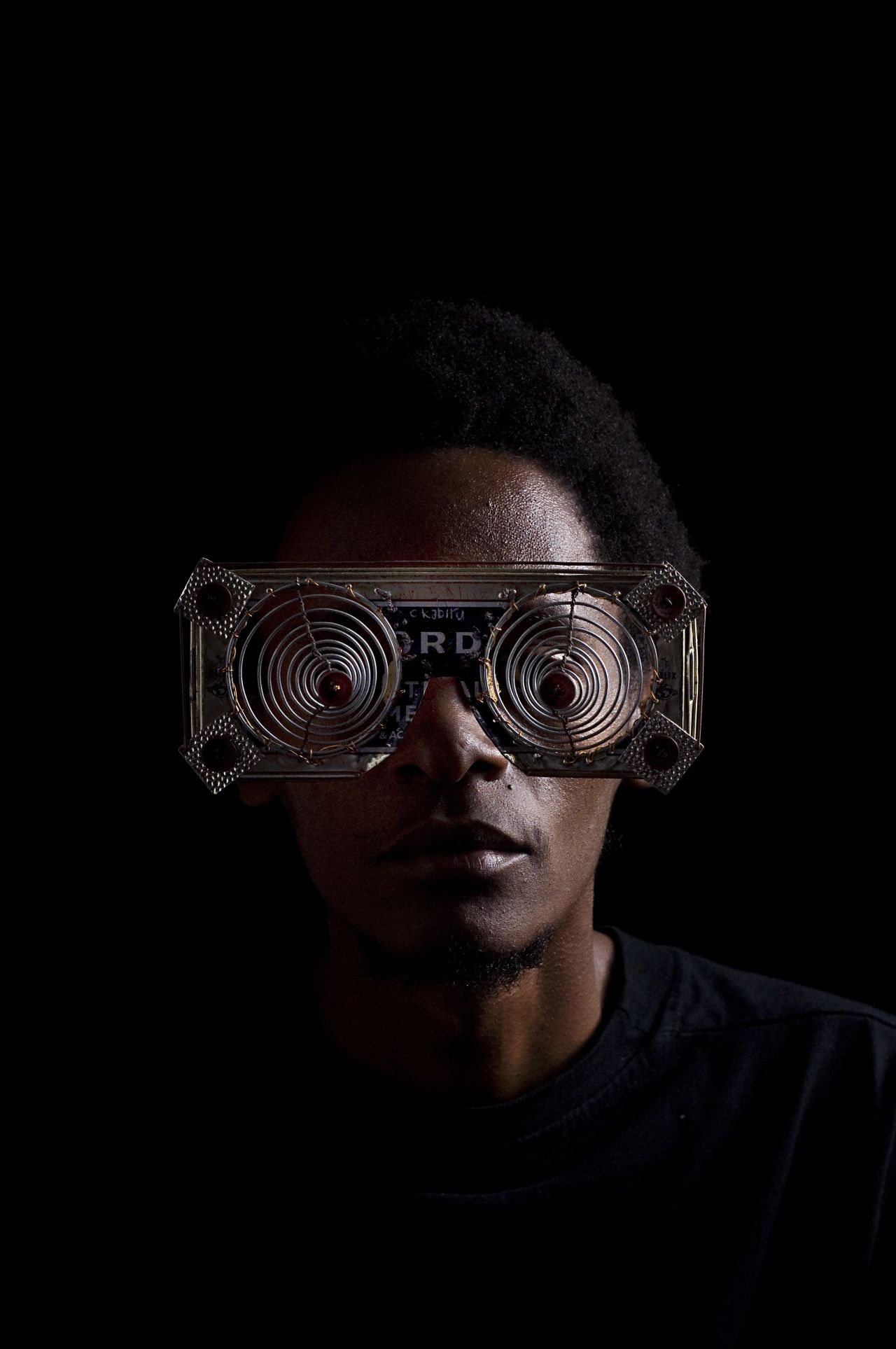 Kabiru roams the streets of Nairobi, Kenya's capital, to collect materials he can use in his work -- everything from scrap metal and plastic to cutlery and bottle tops.