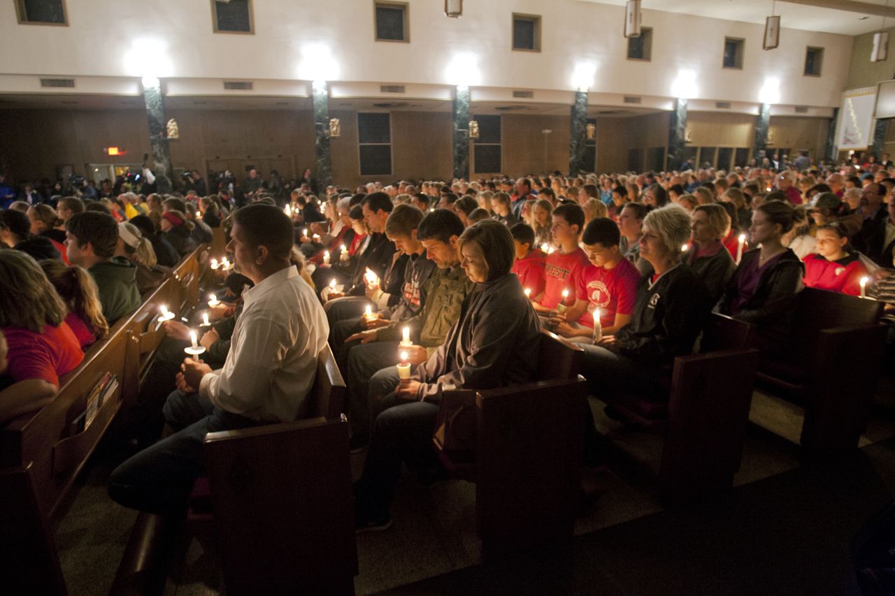 A candlelight vigil is held at St. Mary's Catholic Church in West, Texas, on Thursday, April 18.