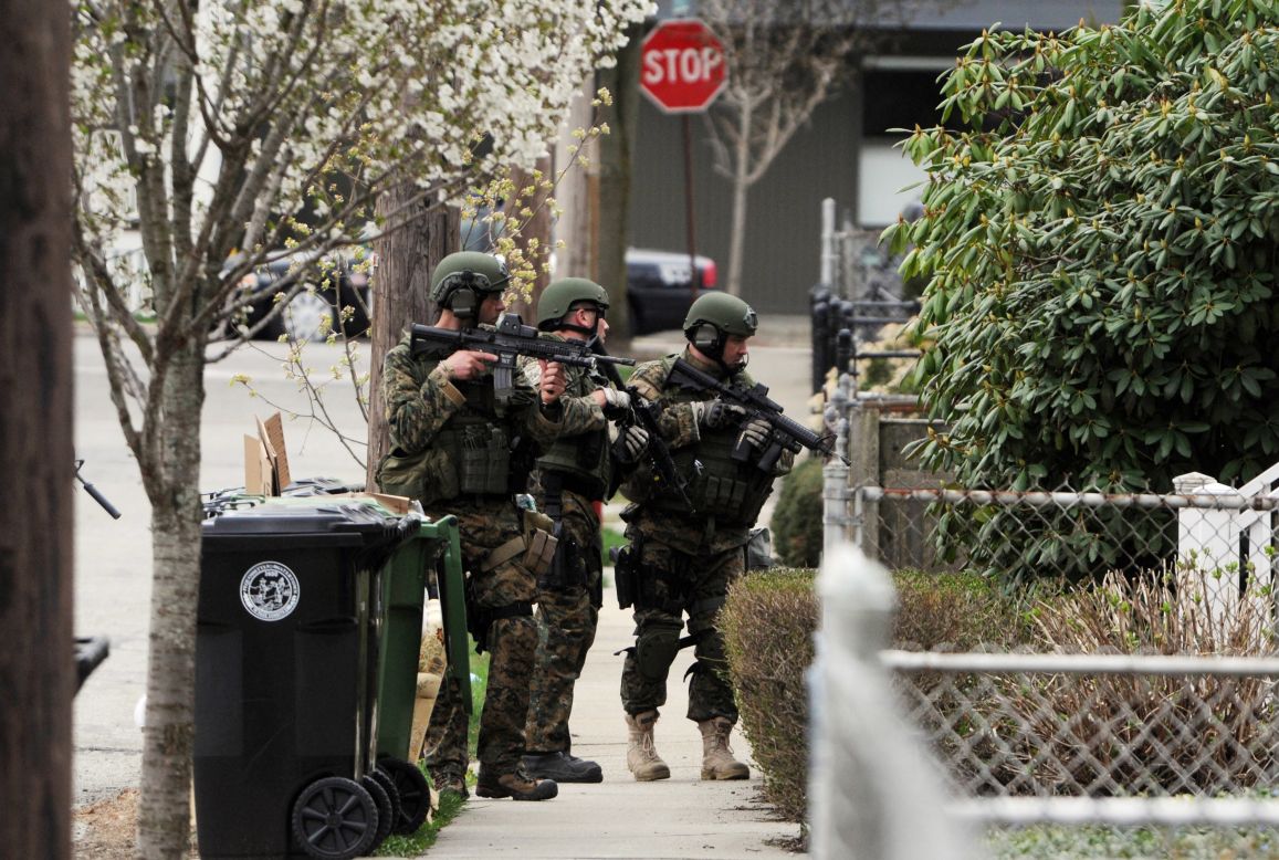 Police to continue to the door-to-door search on Francis Street in Watertown, Massachusetts, on Friday.