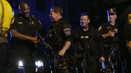 Police officers and SWAT team members celebrate after the successful operation to capture 19-year-old bombing suspect Dzhokhar A. Tsarnaev on April 19 in Watertown, Massachusetts.