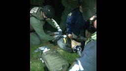 An image posted to the social sharing website Reddit purports to show suspect Dzhokar Tsarnaev being detained by law enforcement offiers.