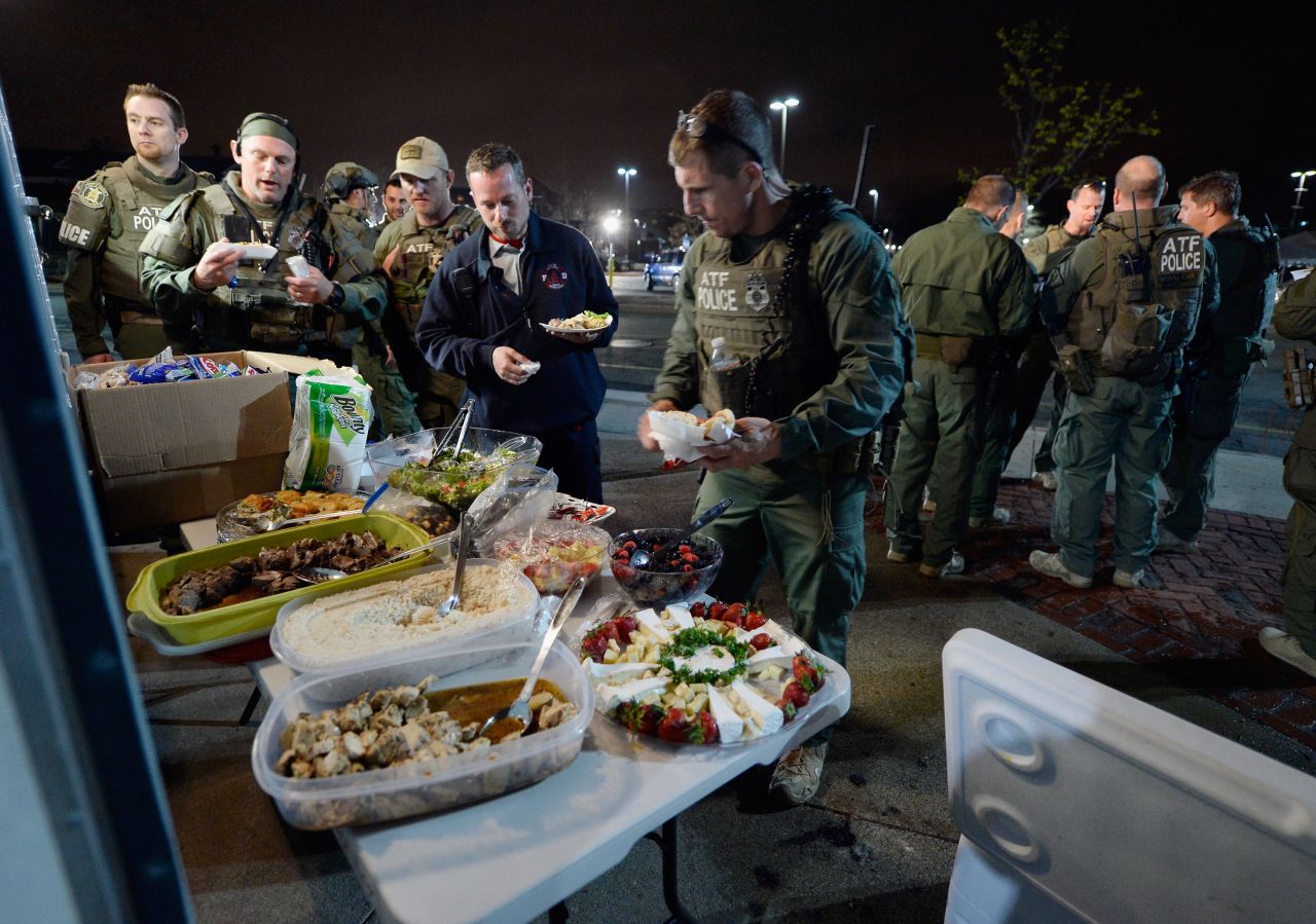 Officers from the Department of  Alcohol, Tobacco, Firearms and Explosives relax Friday  after the capture in Watertown, Massachusetts. 