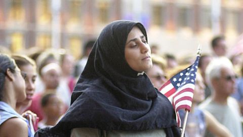 A Muslim woman attends an interfaith vigil for September 11 victims in Boston last fall.