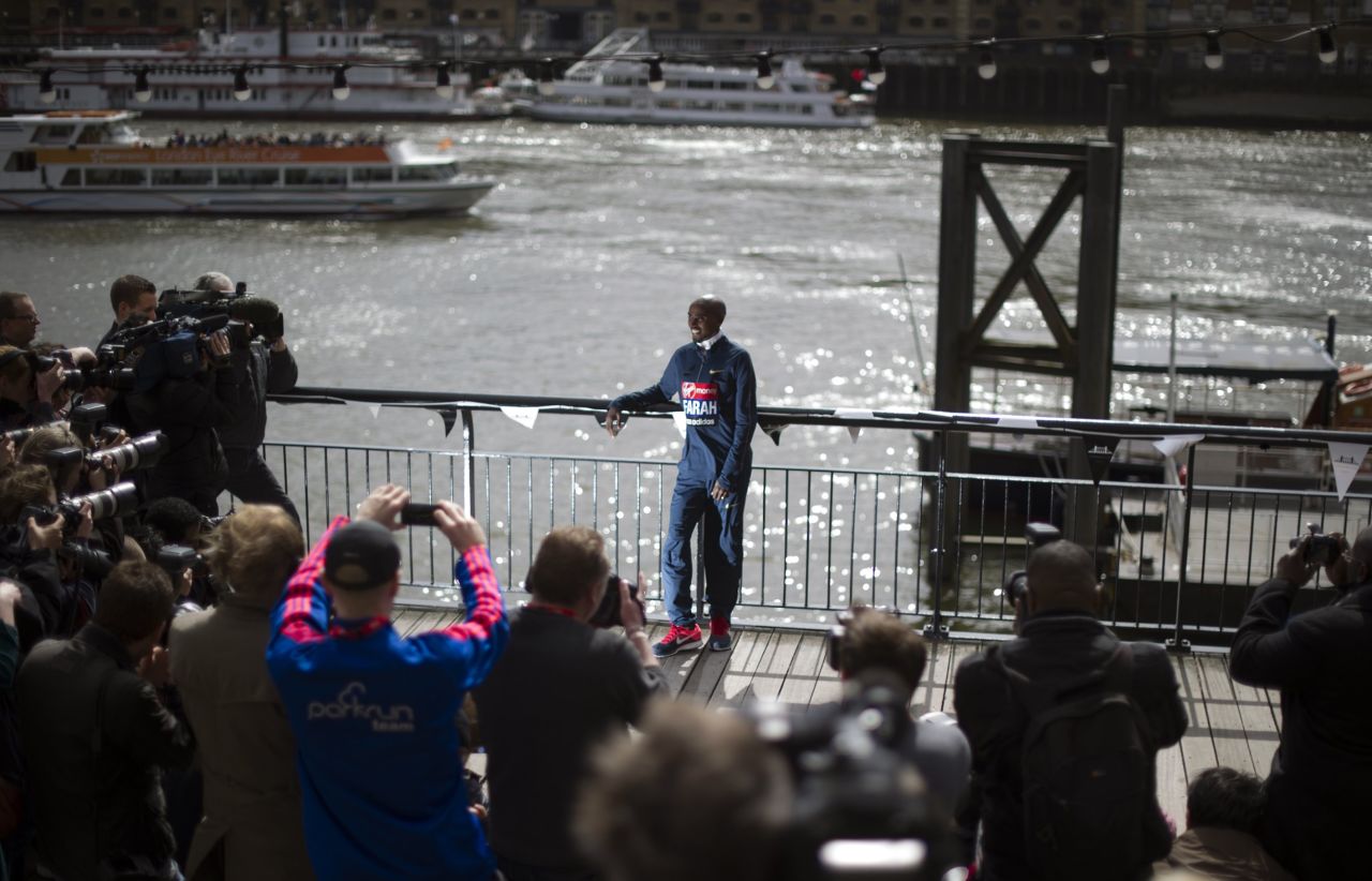 British Olympic double gold medalist Mo Farah poses for photographers in central London on April 18, 2013 during a photo call ahead of the London marathon. The London Marathon will go ahead as planned on April 21, 2013 after security arrangements were reviewed in the wake of the bombings that caused carnage at the Boston Marathon, organizers and police said. 