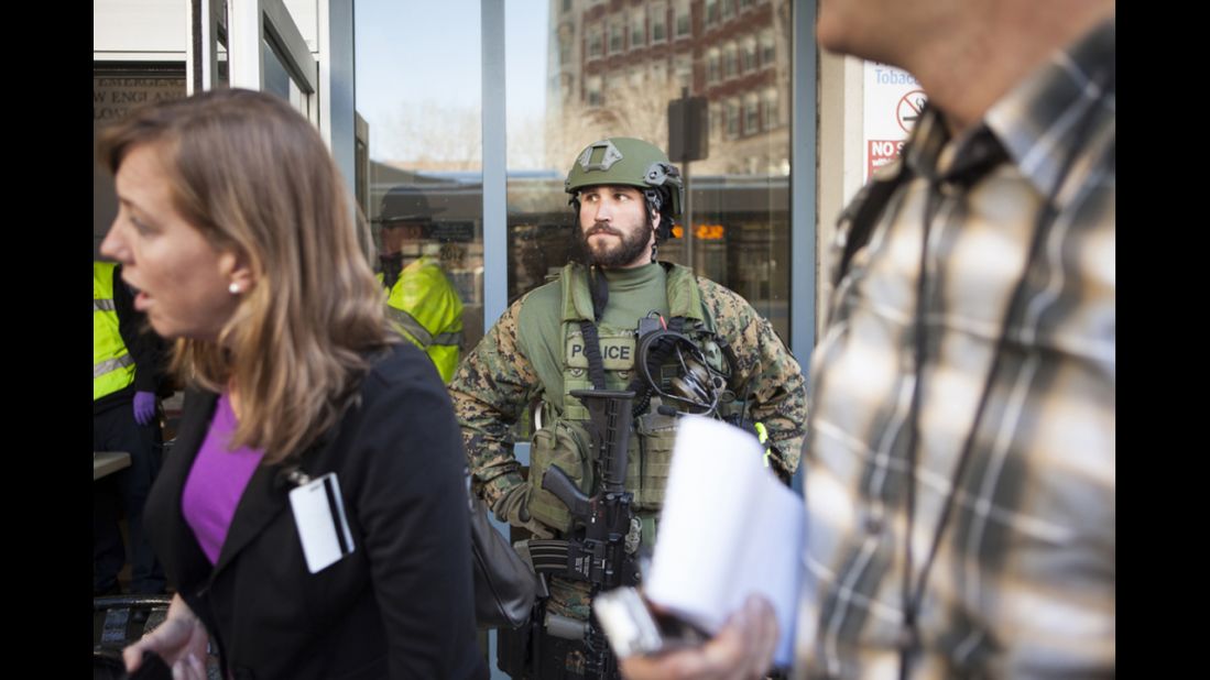 SWAT team member Scott Brooks guards the entrance of Tufts Medical Center, one of several hospitals that received patients after the Boston Marathon bombings on Monday, April 15.