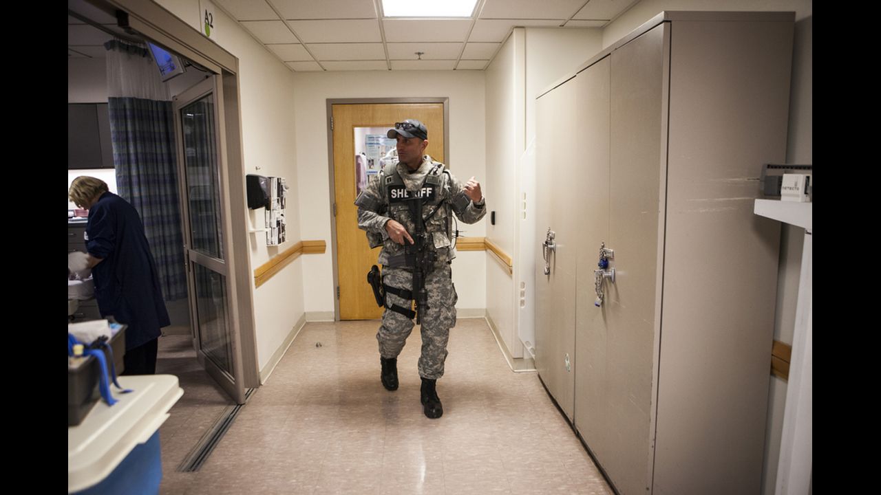 Security was heightened at the Tufts Medical Center, with SWAT teams roaming hallways. 