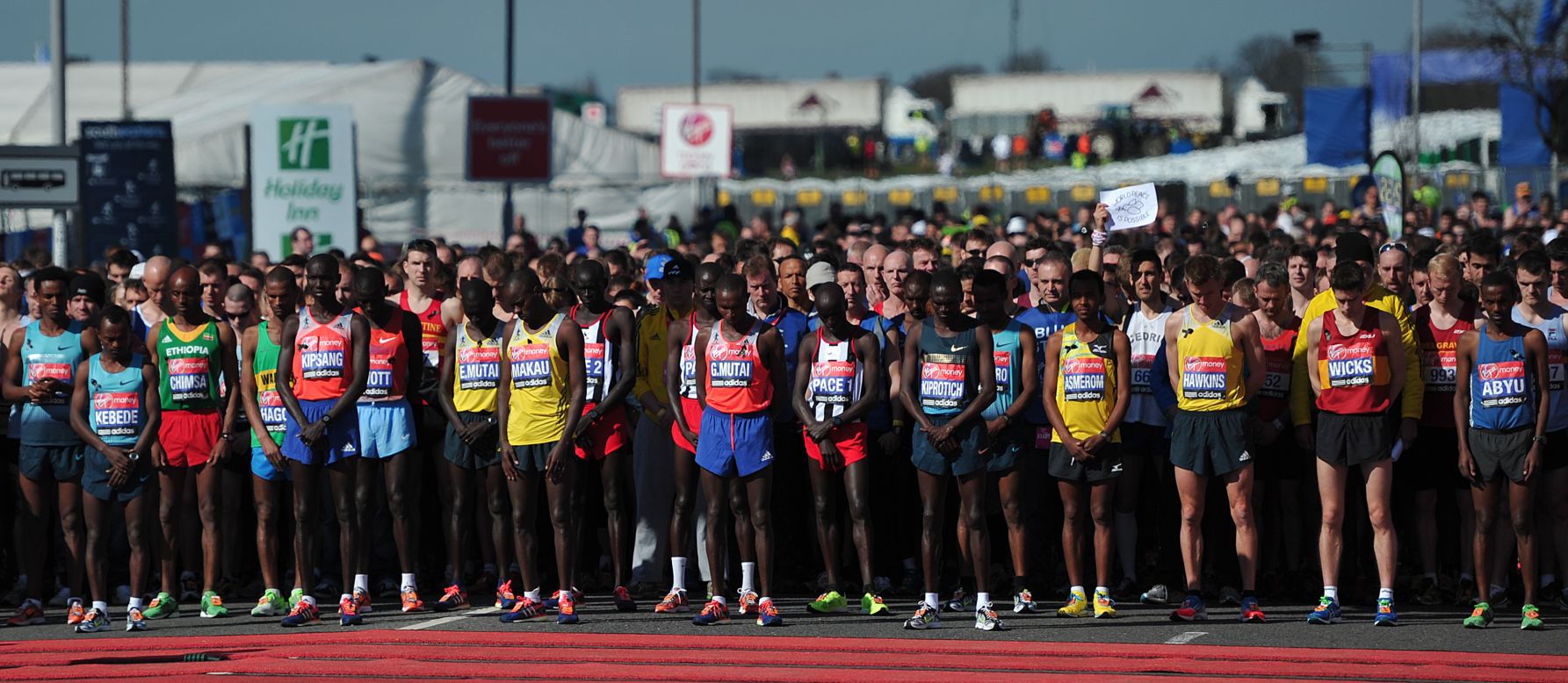 Runners in the men's elite race of the 2013 Virgin London Marathon observe 30 seconds of silence in honor of the victims of the Boston Marathon bombings before the start of the race in London on Sunday, April 21. People worldwide expressed their condolences after at least three people were killed and scores wounded in two explosions Monday near the finish line of the Boston Marathon. <a href="http://www.cnn.com/SPECIALS/us/boston-bombings-galleries/index.html">See all photography related to the Boston bombings.</a>