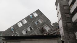 This picture taken on April 21, 2013 shows a damaged building two days after an earthquake hit, in Ya'an City, southwest China's Sichuan province.  Thousands of rescue workers combed through flattened villages in southwest China in a race to find survivors from a powerful quake as the toll of dead and missing rose past 200.      CHINA OUT       AFP PHOTO        (Photo credit should read STR/AFP/Getty Images)