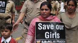 Political activists demonstration against the rape of a five-year old girl, in New Delhi on April 21, 2013