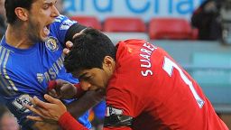  Liverpool's Luis Suarez has been banned for 10 games by the English Football Association for biting Chelsea's Branislav Ivanovic during Sunday's match at Anfield. It was the latest example of a player displaying questionable behavior in front of a vast array of television cameras. As football coverage has grown over the last two decades, so has the scrutiny placed on the stars of the "beautiful game." In this gallery, CNN highlights times when players have seemingly forgotten the eyes of the world are watching...