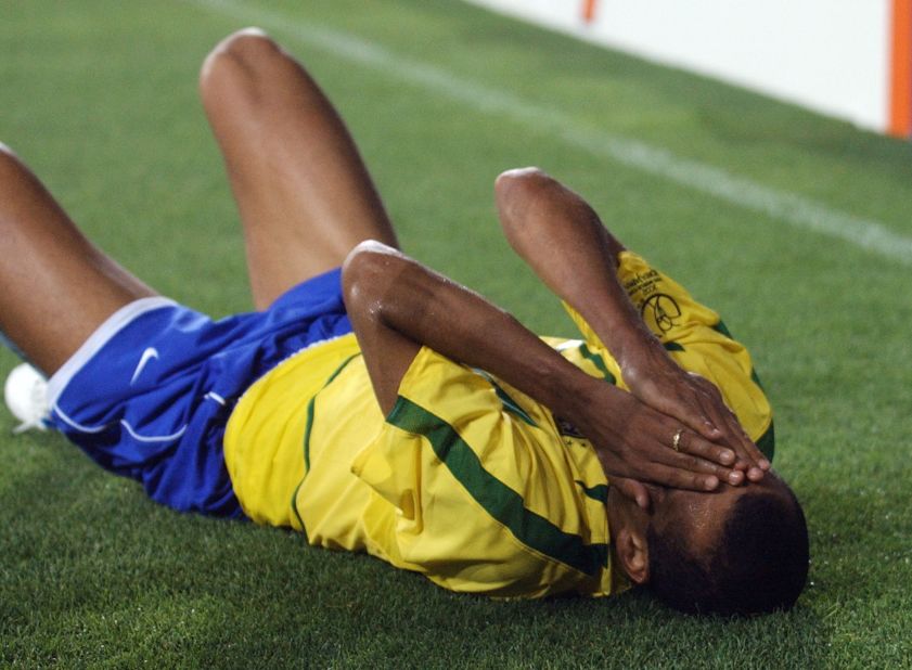 It is not just acts of violence which can make players unpopular. Brazil's Rivaldo was criticized, and ridiculed, following a group stage match against Turkey at the 2002 World Cup. Rivaldo went to the floor claiming Hakan Unsal had kicked the ball into his face, despite replays showing it had clearly hit him in the leg. Unsal was given a second yellow card and sent off, while Brazil went on to win the match 2-1. FIFA retrospectively punished Rivaldo with a fine, but the playmaker had the last laugh as Brazil went on to lift football's biggest prize for a record fifth time.