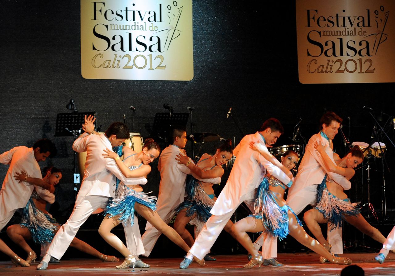 Thousands of people in Cali, Colombia earn their living from the salsa industry -- whether working at dance schools, ballrooms and party rooms or as tailors or other related jobs. Here, members of Argentina's "Bien chevere" dance school perform during the 7th World Salsa Festival held in Cali in September  2012. 