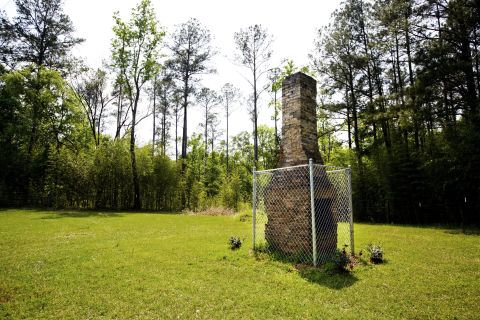 A dilapidated chimney is all that remains of Jackie Robinson's family home in rural Grady County. The house burned down in 1996, but the property is owned and maintained by his cousin Linda Walden.