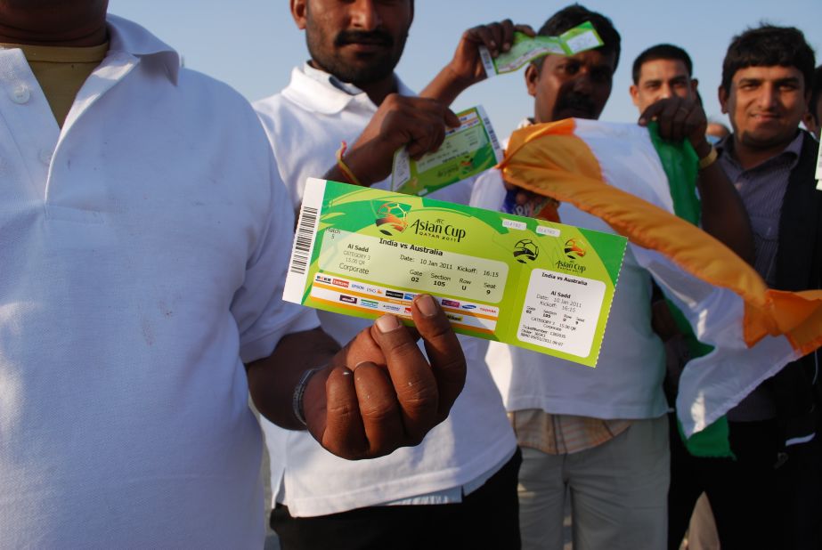 The issue of how migrant workers are treated has long been a hot topic in the Gulf. The UAE, Saudi Arabia, Kuwait and Bahrain have all been criticized in the past for their poor treatment of guest workers. But the 2022 World Cup has focused attention on Qatar. Here one Indian worker proudly shows his ticket for a match at the 2011 Asian Cup finals, hosted in Doha. 
