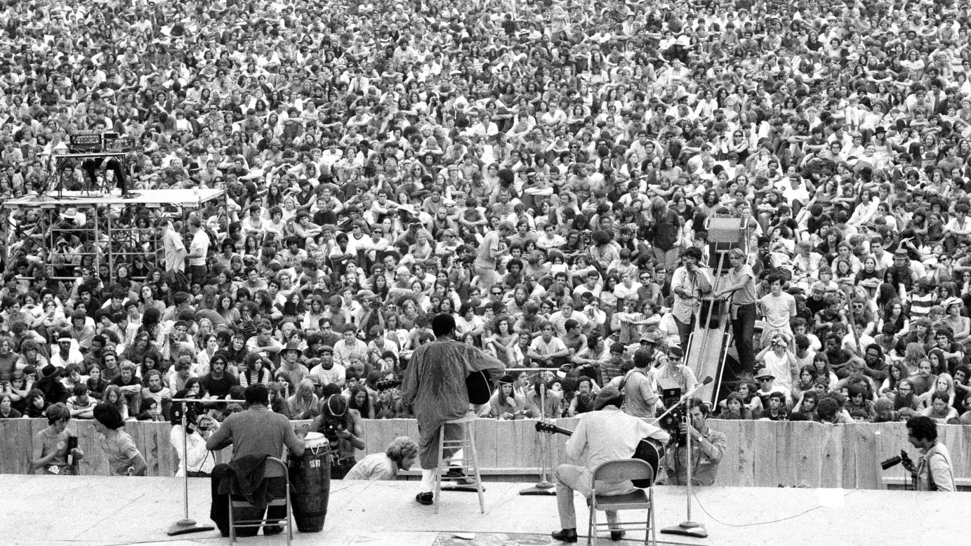 As the opening act at Woodstock, Havens takes the stage in front of thousands of people in Bethel, New York, on August 15, 1969.