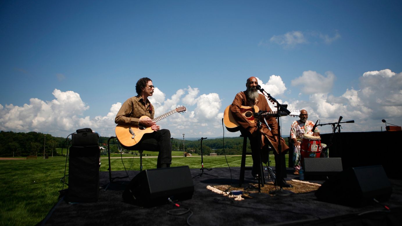 Havens, center, reprises his 1969 performance of "Freedom" at the site of the original Woodstock music festival in Bethel, New York, on August 14, 2009.