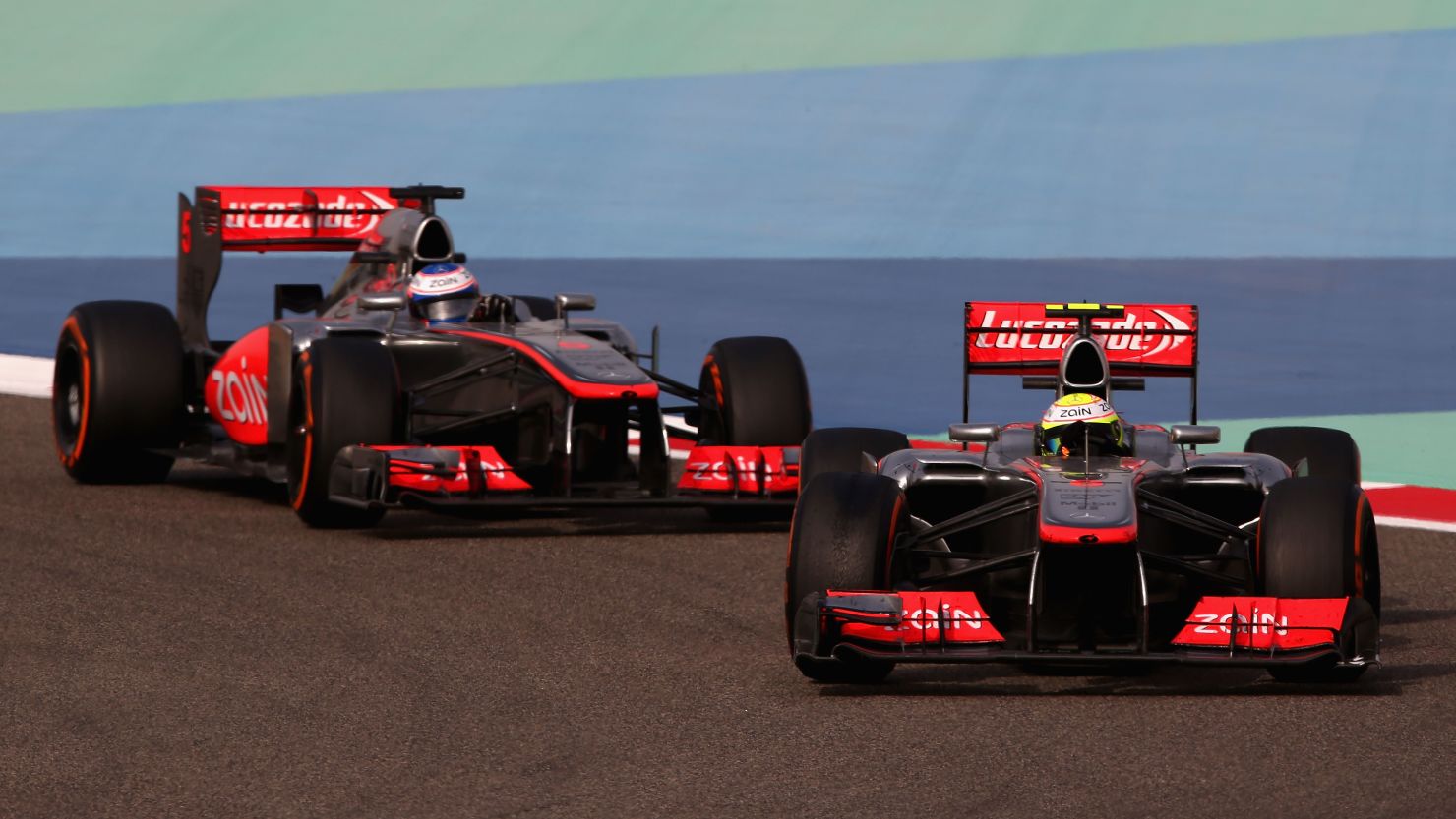 McLaren's Sergio Perez leads teammate Jenson Button during the Bahrain Grand Prix at Sakhir on Sunday.