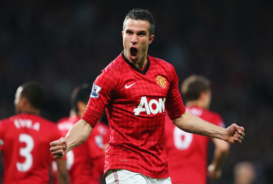 Manchester United striker Robin van Persie celebrates after scoring the opening goal the 3-0 win over Aston Villa as the Red Devils secured the English Premier League title.