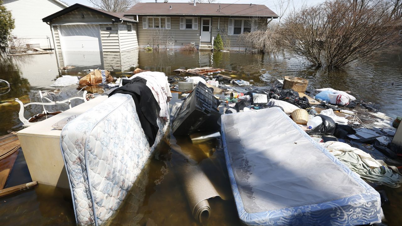 Household items are submerged in floodwaters in front of a house in Fox Lake, Illinois, on Monday, April 22. Steady rains are expected Tuesday, April 23, in several Midwestern states already facing severe flooding. Have you been affected by the flooding? <a href="http://ireport.cnn.com/topics/962945" target="_blank">Share your images with CNN iReport</a>.