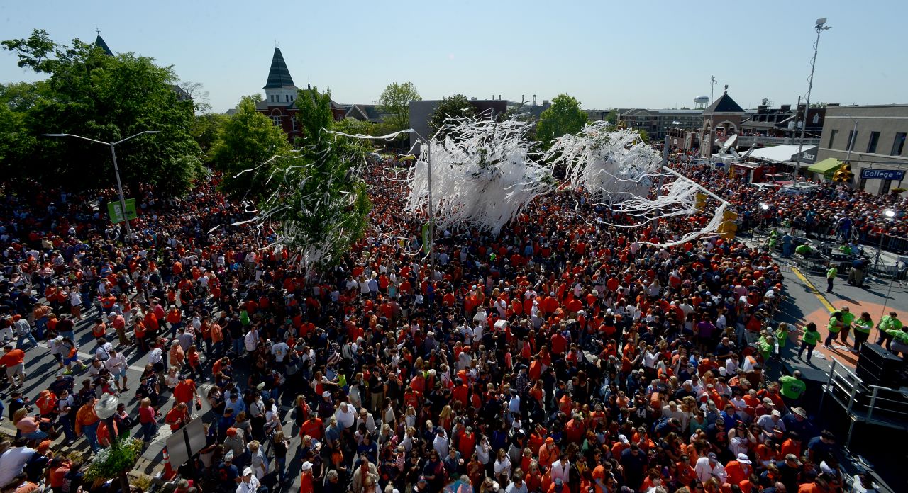 Auburn fans roll the famous oak trees at Toomer's Corner for the last time on Saturday, April 20, after Auburn held its A-Day spring football game.