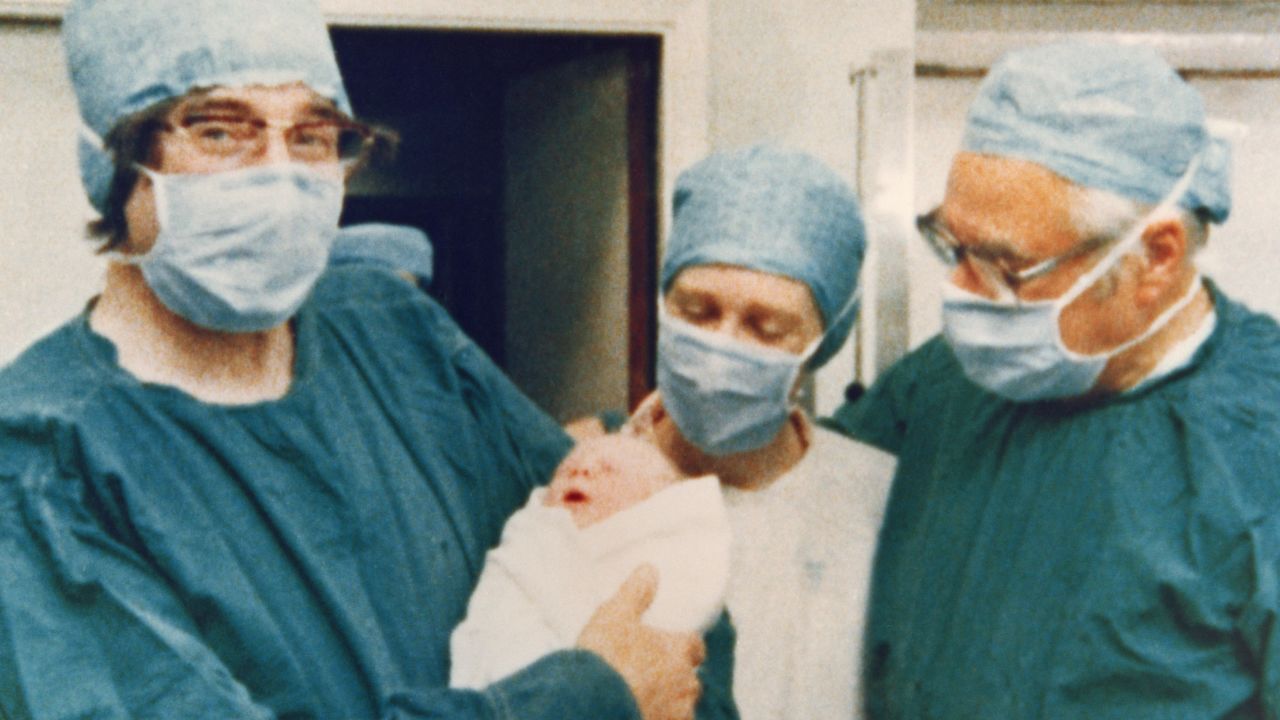 <a href="http://www.cnn.com/2013/04/10/health/obit-edwards-ivf/index.html">Sir Robert Edwards</a>, a "co-pioneer" of the in vitro fertilization technique and Nobel Prize winner, died April 10 in his sleep after a long illness, the University of Cambridge said. He was 87. He is pictured on July 25, 1978, holding the world's first "test-tube baby," Louise Joy Brown, alongside the midwife and Dr. Patrick Steptoe, who helped develop the fertility treatment.