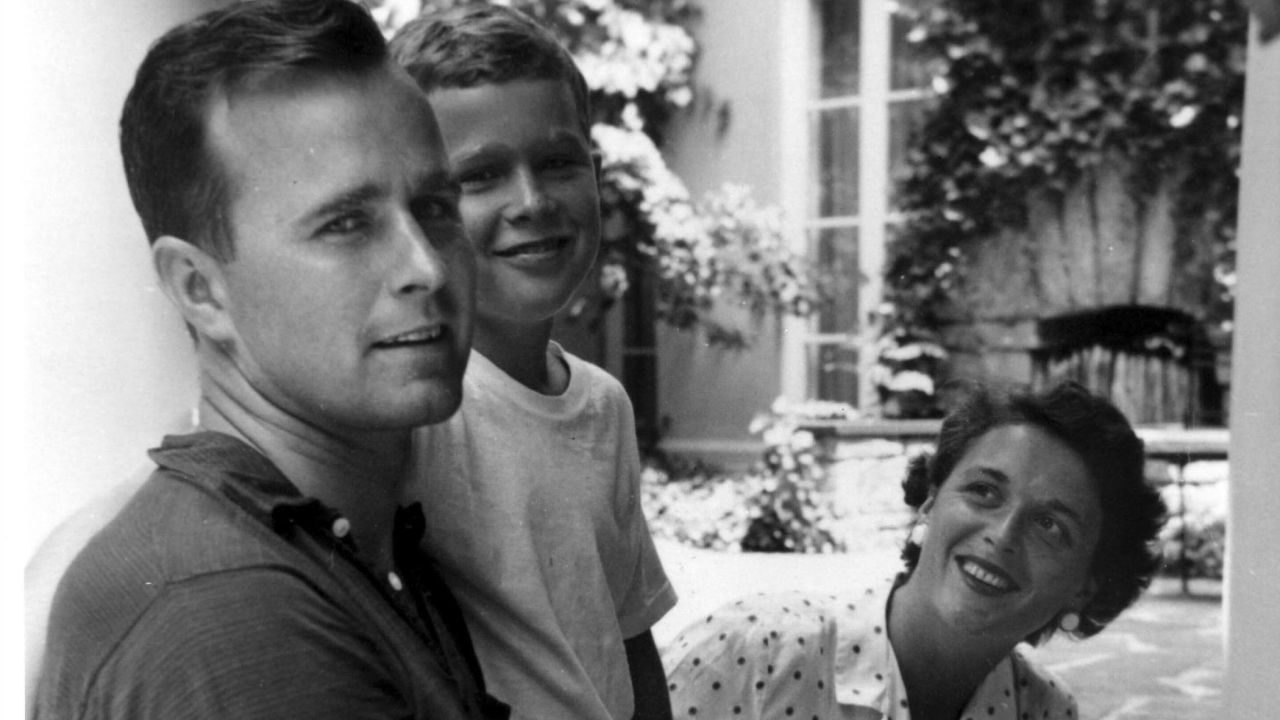 Bush and his parents are photographed in Rye, New York, during the summer of 1955. Bush's grandfather, Prescott Bush, became a US senator in 1952.
