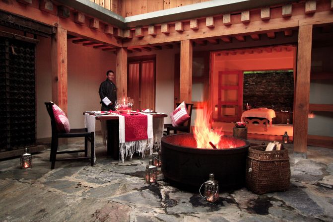 The 11 rooms in the Uma Punakha hotel are just off a central courtyard with views over rice fields toward the Himalayas. 