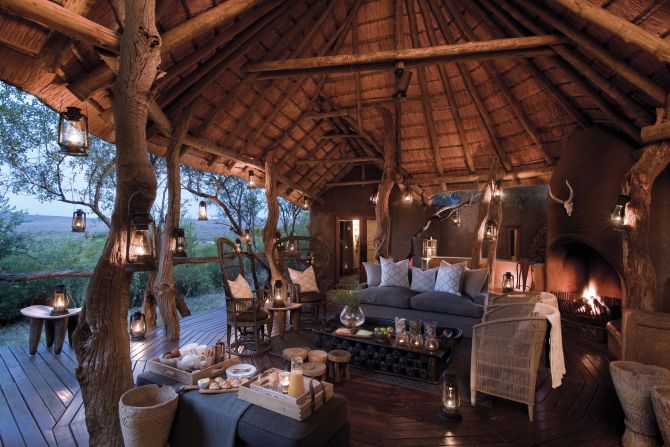Located in a game reserve, the Madikwe Safari Lodge offers stunning views of passing wildlife amid rustic luxury. 