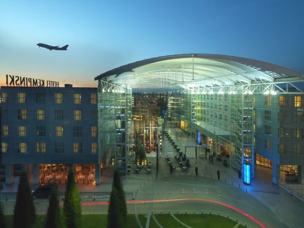 Soundproof windows and blackout curtains help guests disconnect from the busy travel landscape outside at the Kempinski Hotel at the Munich, Germany airport.