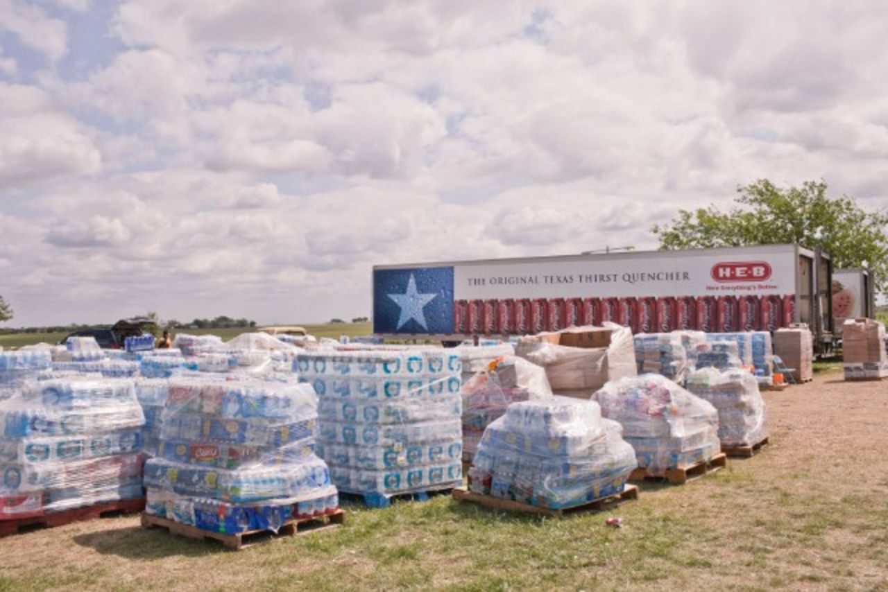 Water donations stack up at the site of Westfest, a fall celebration of Czech heritage.