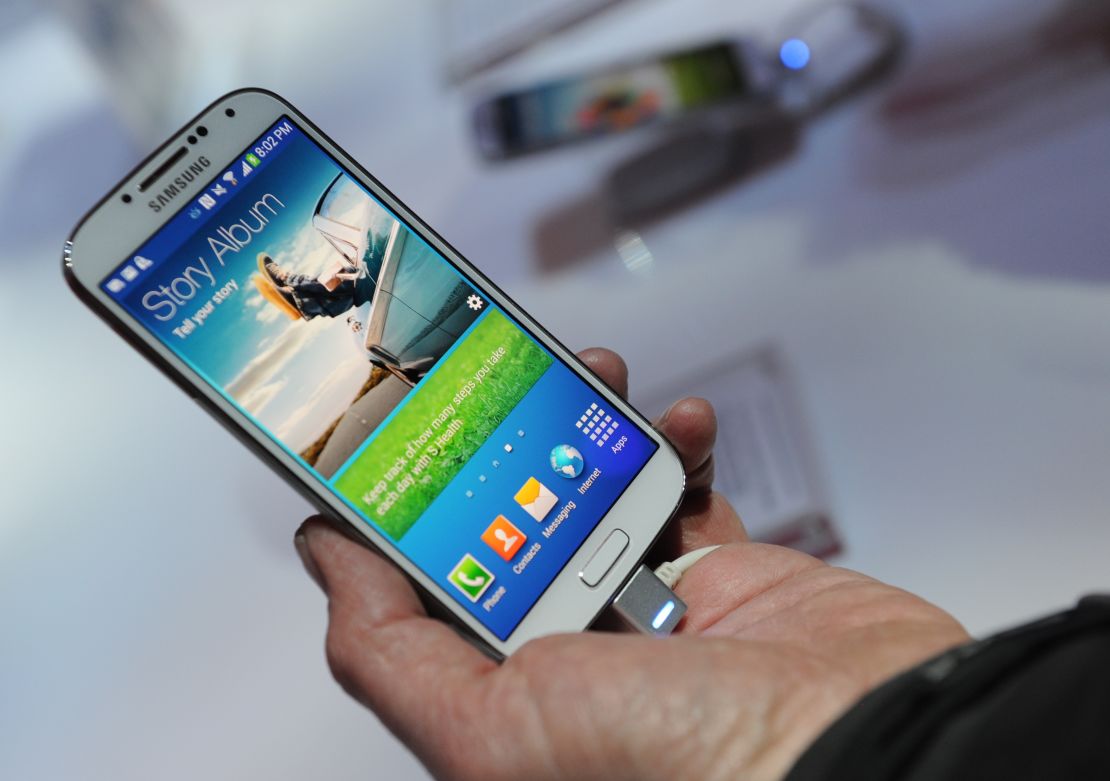The new phone is expected to look different from Samsung's popular Galaxy S4, shown here. 
