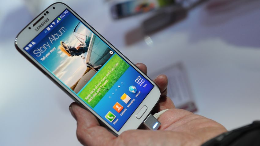 This file photo taken on March 14, 2013 shows Samsung's new Galaxy S4 during its unveiling at Radio City Music Hall in New York. Samsung's latest flagship Galaxy smartphone goes on sale this week, as the South Korean giant seeks to cement its lead over faltering rival Apple in an increasingly saturated market. The Galaxy S4, armed with eye motion control technology that will pause a video when the user looks away, comes with a faster chip and is thinner and lighter than the previous S3 model. 