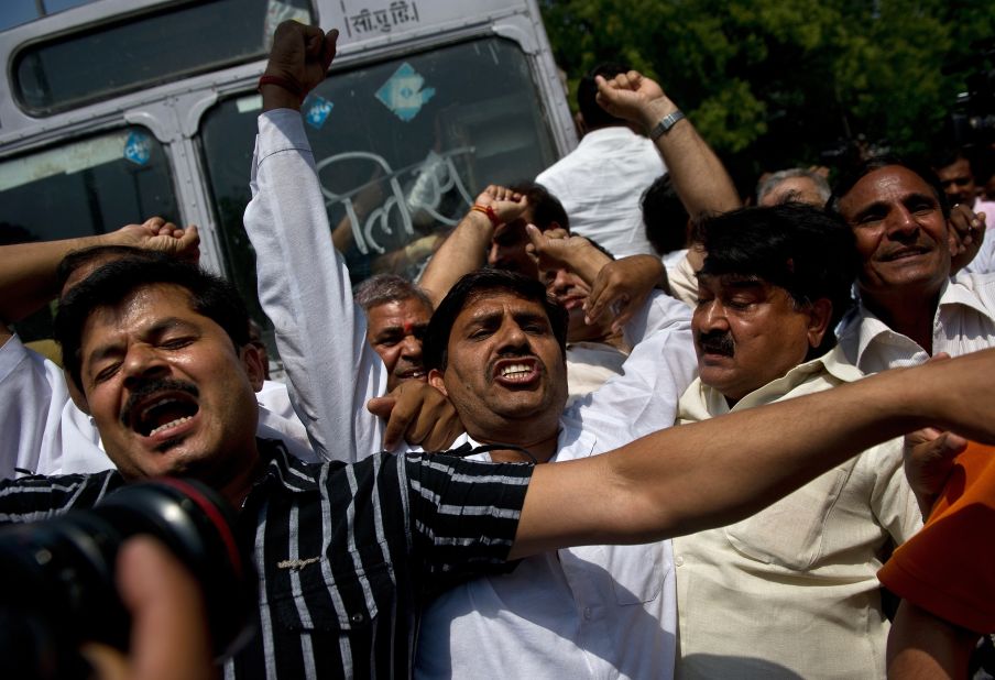 Activists protest in New Delhi on Monday, April 22.