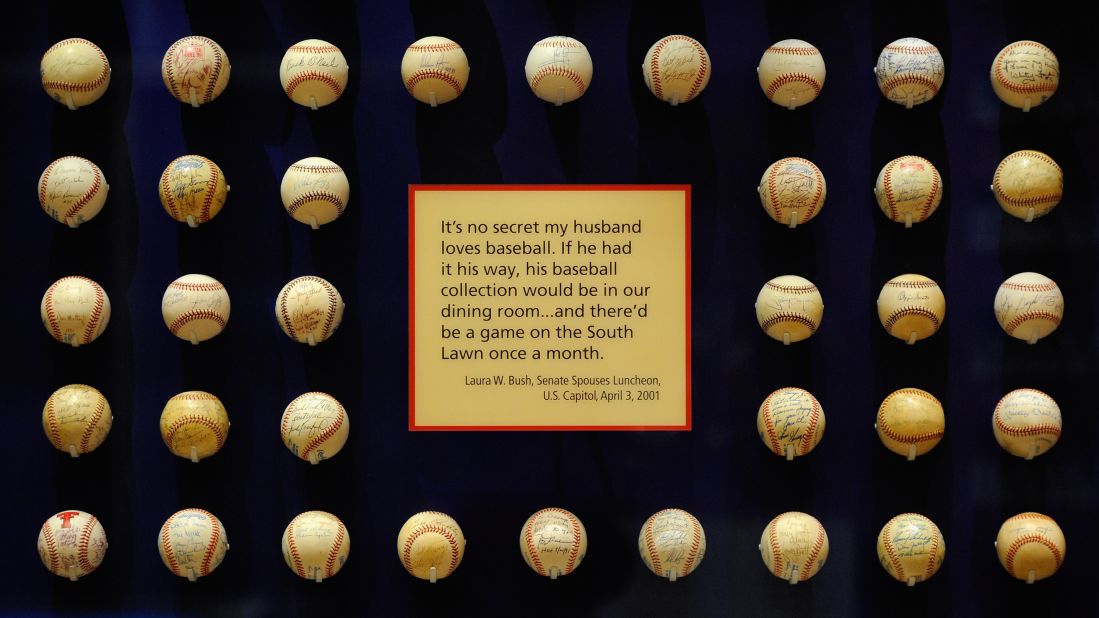 President George W. Bush's baseball collection is on display in the center.